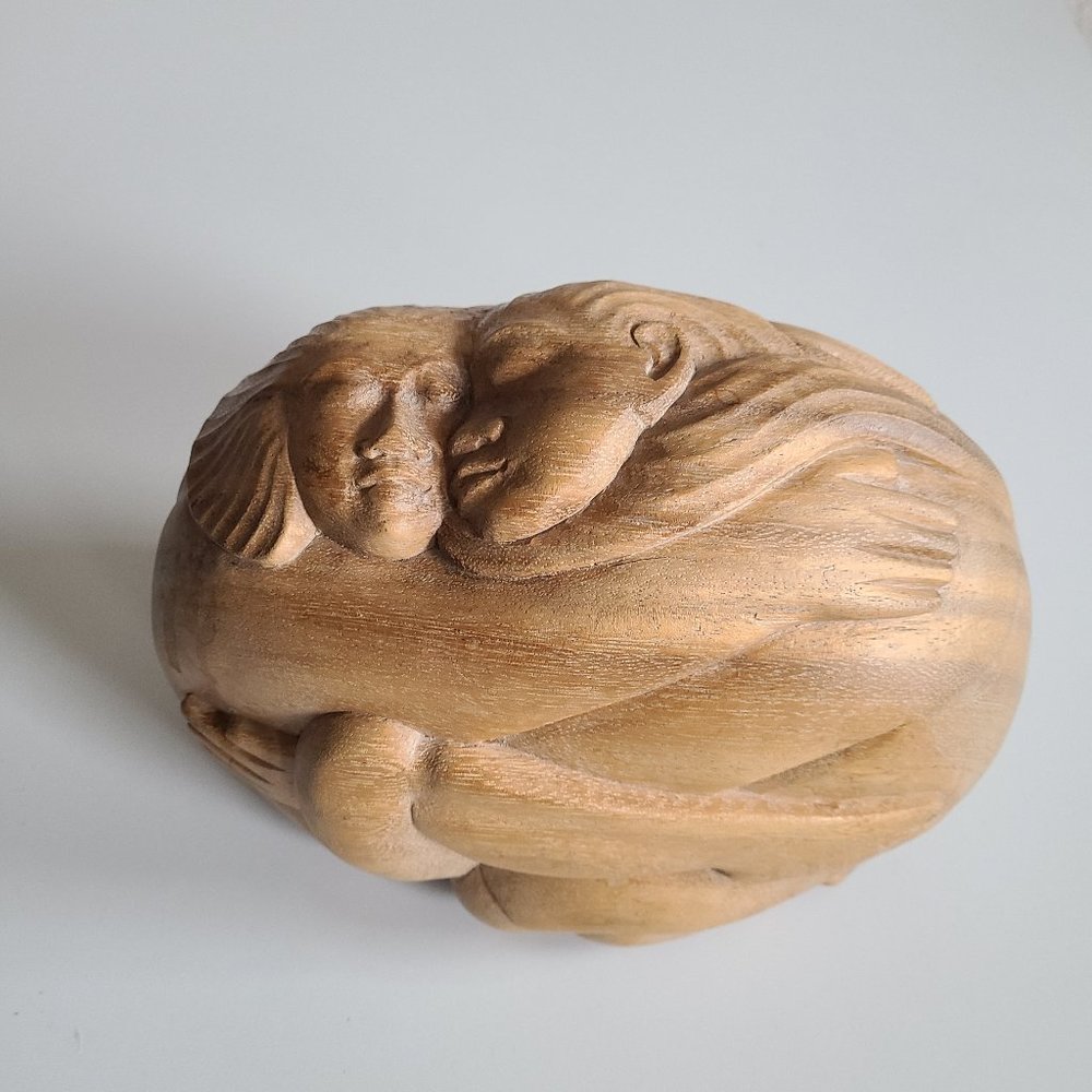 Vintage hand carved wooden sculpture.